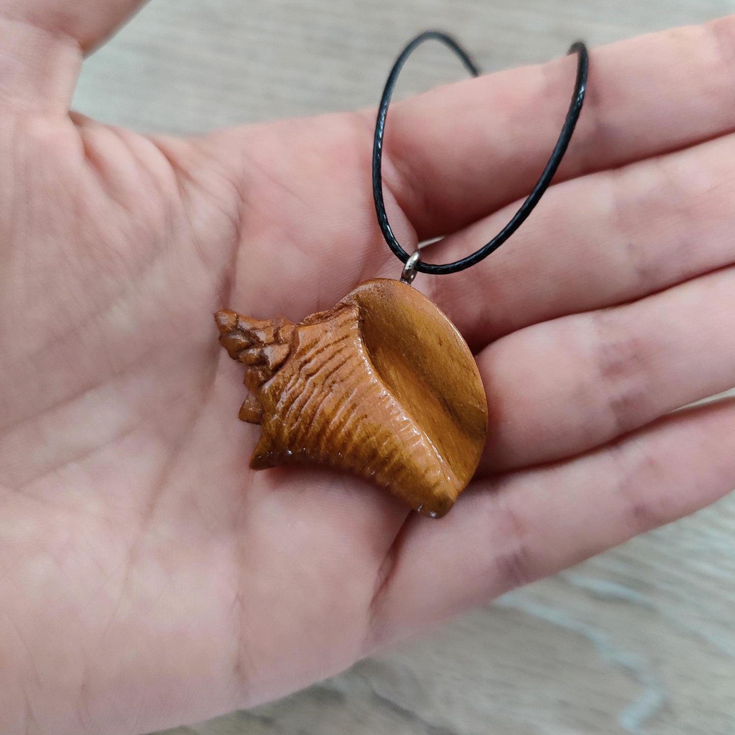 Conch "Lambi" Necklace | Hand-Carved Apricot Wood Pendant, Waxed Rope | Secrets of Ouanalao